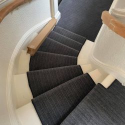 Curved stairs fitted with a carpet stair runner in Consett