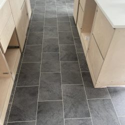 Grey LVT tile effect flooring installation in Durham