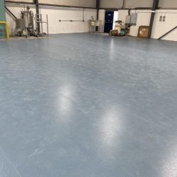 Blue safety flooring installed in a warehouse in Consett