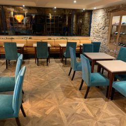 Geometric wood effect LVT floor a restaurant in Consett